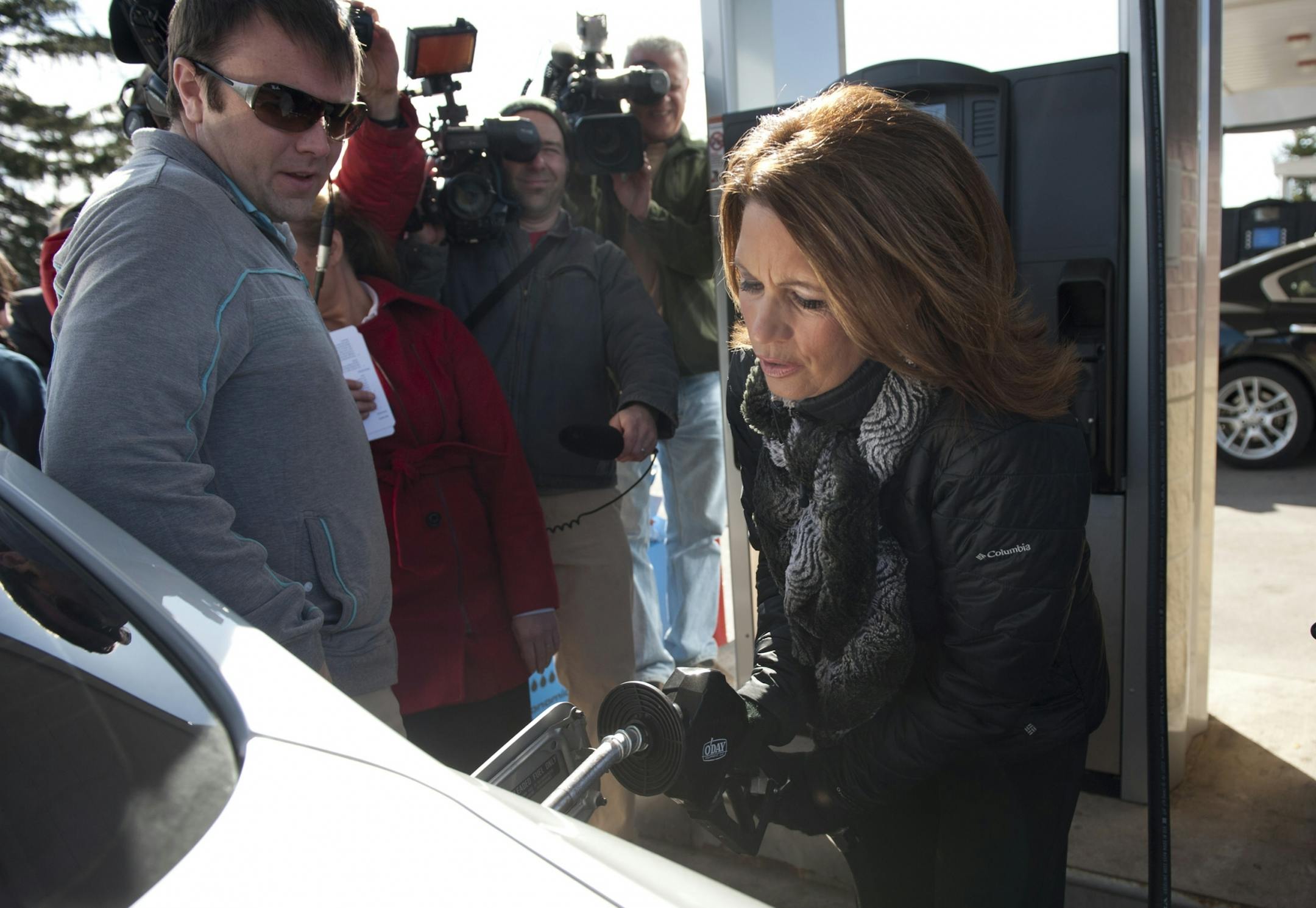 Congresswoman Michelle Bachmann blamed President Obama for the high price of gasoline Tuesday, April 10, 2012 at the Fast Break Gas Station in Lino Lakes as she pumped gas for a few customers using the customers credit cards.