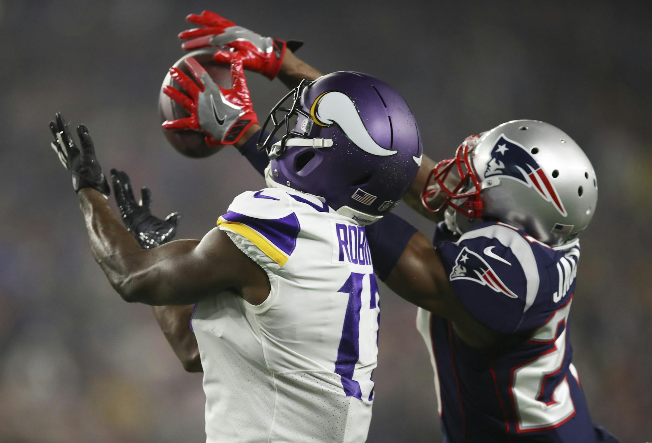 New England Patriots defensive back J.C. Jackson (27) deflected a pass intended for Minnesota Vikings wide receiver Aldrick Robinson (17) in the end zone in the fourth quarter. The bobbled ball ended up in the hands of the Patriots' strong safety Duron Harmon. ] JEFF WHEELER &#xef; jeff.wheeler@startribune.com The Minnesota Vikings lost to the New England Patriots 24-10 in an NFL game Sunday evening, December 2, 2018 at Gillette Stadium in Foxborough, MA.