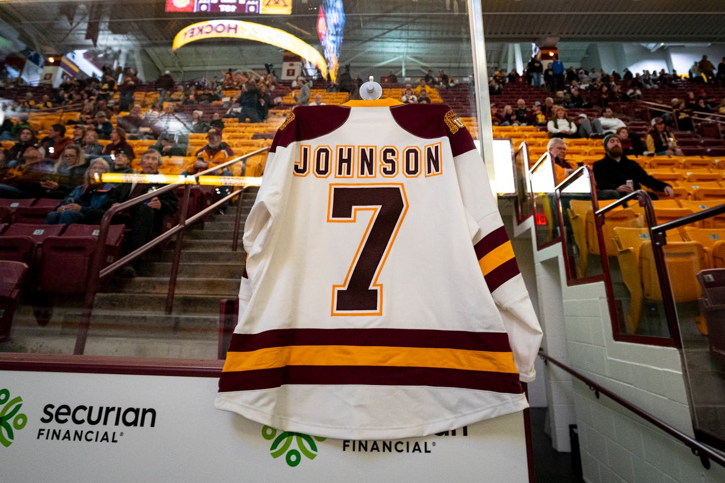 Former UMD hockey player Adam Johnson's jersey hangs in memoriam for the player who died during a game the previous weekend. It hangs before the Minnesota game in 3M Arena at Mariucci in Minneapolis, Minn. on Friday, Nov. 3, 2023. ] Angelina Katsanis • angelina.katsanis@startribune.com