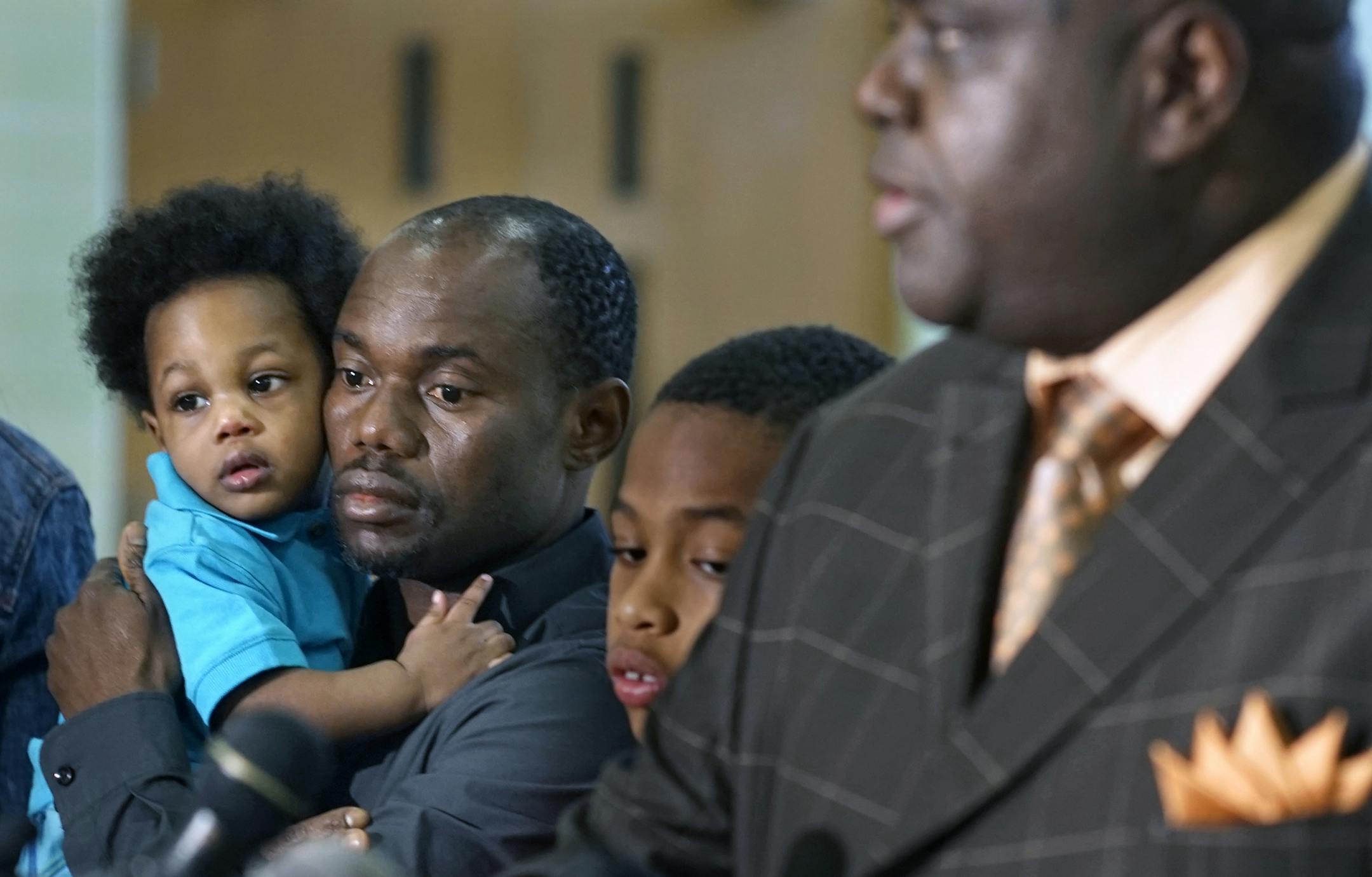 Pastor Harding Smith, who has been representing Barway Collins' family conducted a press conference today regarding recent allegations about the father taking out life insurance on the boy. Pierre Collins, the father of Barway was holding his son Marck,1.] Richard Tsong-Taatarii/rtsong-taatarii@startribune.com ORG XMIT: MIN1504061700242481