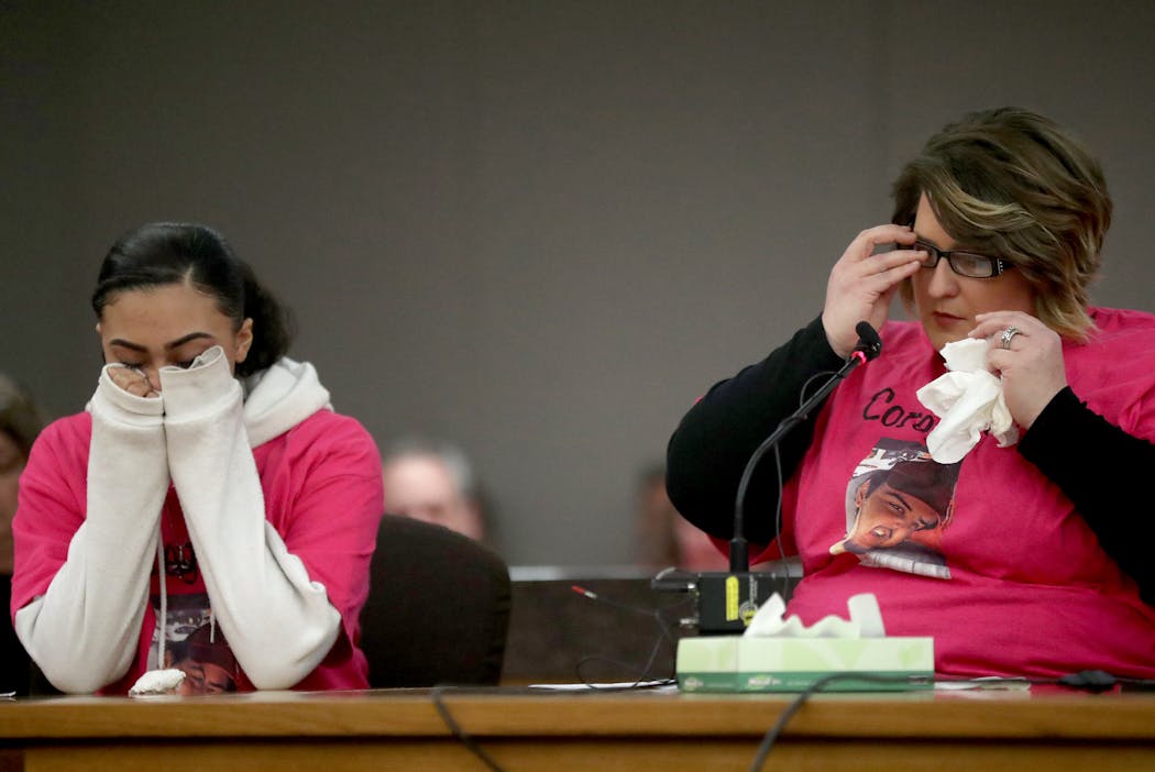 Bobbie Alhaqq, the mother of 19-year-old murder victim Corey Elder, paused to wipe a tear as she read a victims impact statement to the court on April 6, 2018. Two women charged with aiding and abetting the murder were resentenced this week after a change of Minnesota law.