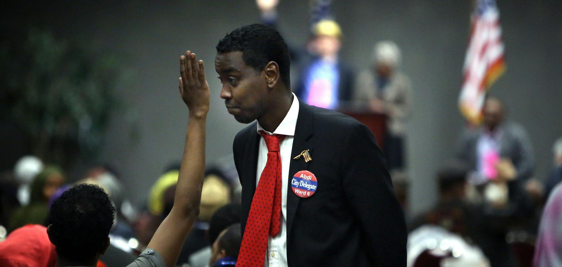 City council candidate Abdi Warsame walked on the convention floor early in the proceedings. ] (JIM GEHRZ/STAR TRIBUNE) / April 27, 2013 / 12:00 PM Minneapolis, MN ‚Äì BACKGROUND INFORMATIN- Minneapolis DFL delegates and alternates for Ward 6‚Äôs City Council race gathered to select who they will endorse in the 2013 elections. Incumbent and council vice president Robert Lilligren surprisingly announced that he will not seek the DFL endorsement. ORG XMIT: MIN1304