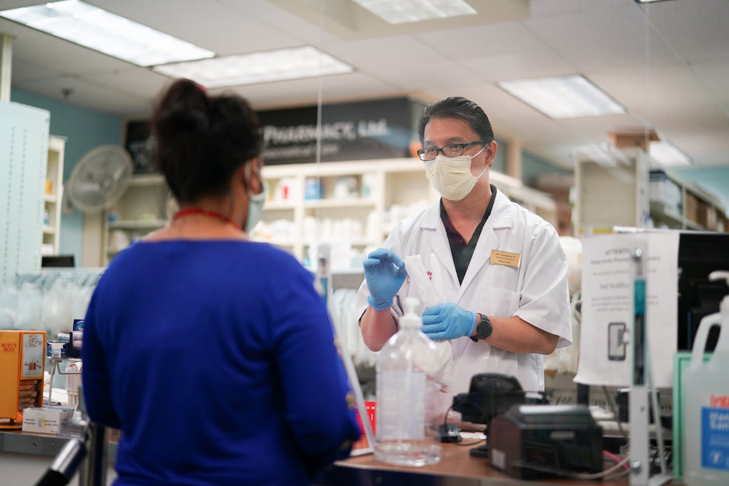 At Hmong Village in St. Paul, business is down 30% at Phalen Family Pharmacy. Co-owner Cheng Seng Lo laid off a part-time cashier and scaled back pharmacy hours. "It's been a struggle," he said.