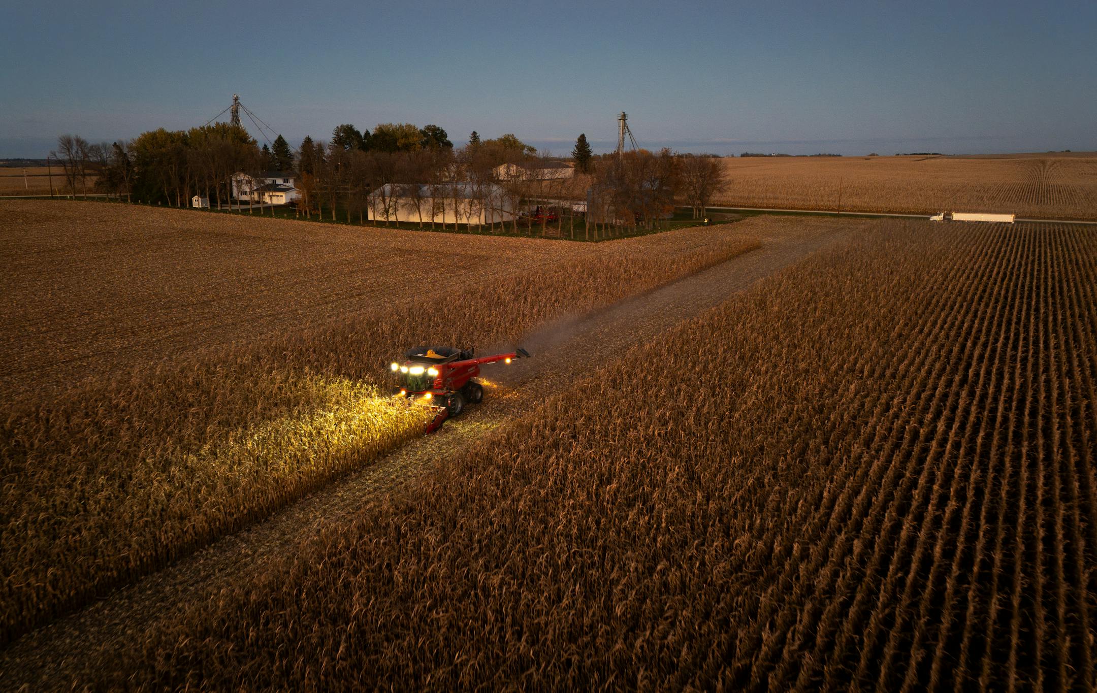 Ben Johnson’s father Steve Johnson drives a Case IH Combine harvesting corn on Ben’s field adjacent to his family home, in the background, during the 2025 harvest.
Wednesday October 22, 2025 

Glen Stubbe for The Minnesota Star Tribune