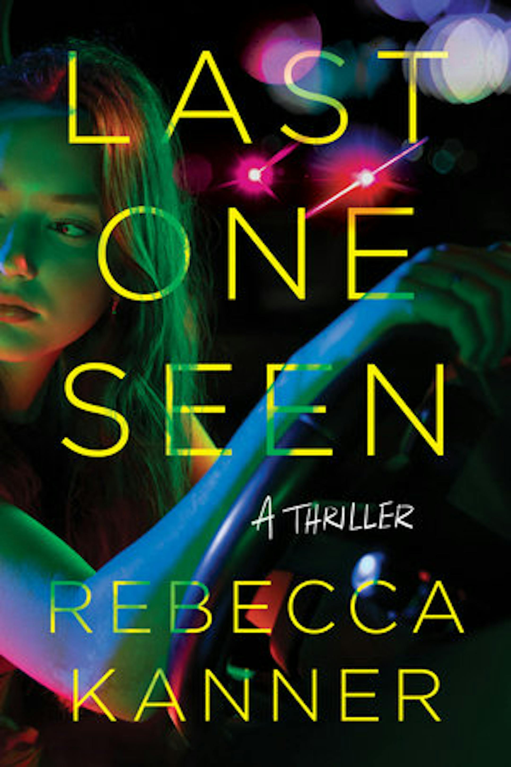 Black cover of Last One Seen features a moodily-lit image of a young woman driving an automobile
