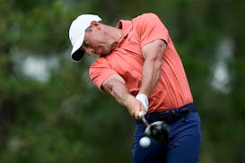 Rory McIlroy hits his tee shot on the 11th hole during the first round of the U.S. Open in Pinehurst, N.C., on Thursday. McIlroy shot a 5-under 65 to 