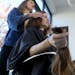 For years, Marti Estey has donated her long, thick hair to charities that make hair pieces for those suffering from hair loss. Here, bangbang Salon st