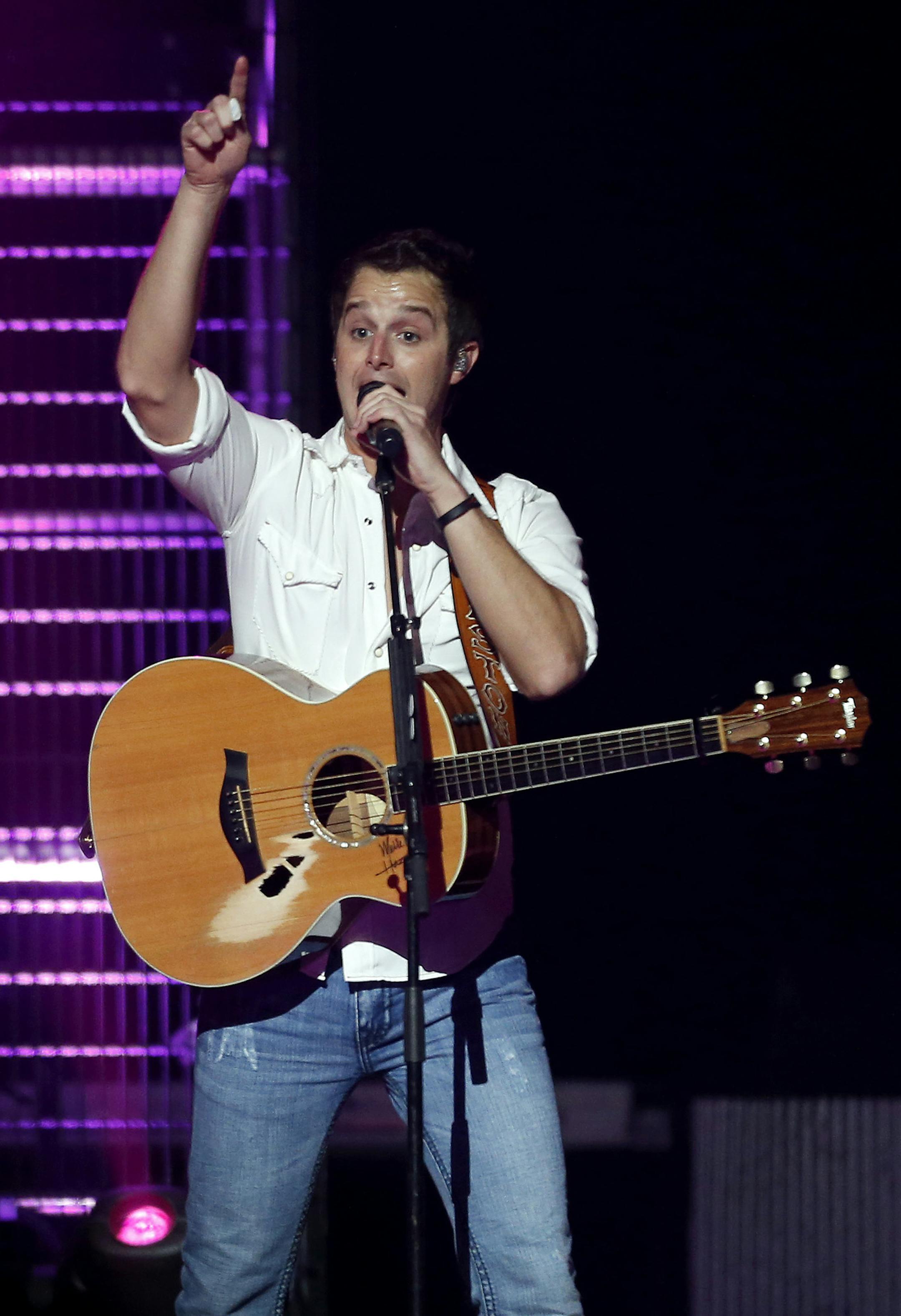 Easton Corbin performed at the Xcel Energy Center on Thursday night. Kramer was one of the opening acts for Blake Shelton. ] CARLOS GONZALEZ cgonzalez@startribune.com September 12, 2013, St. Paul, Minn., Xcel Energy Center, country star and The Voice coach Blake Shelton concert Opening acts - Jana Kramer, Easton Corbin,