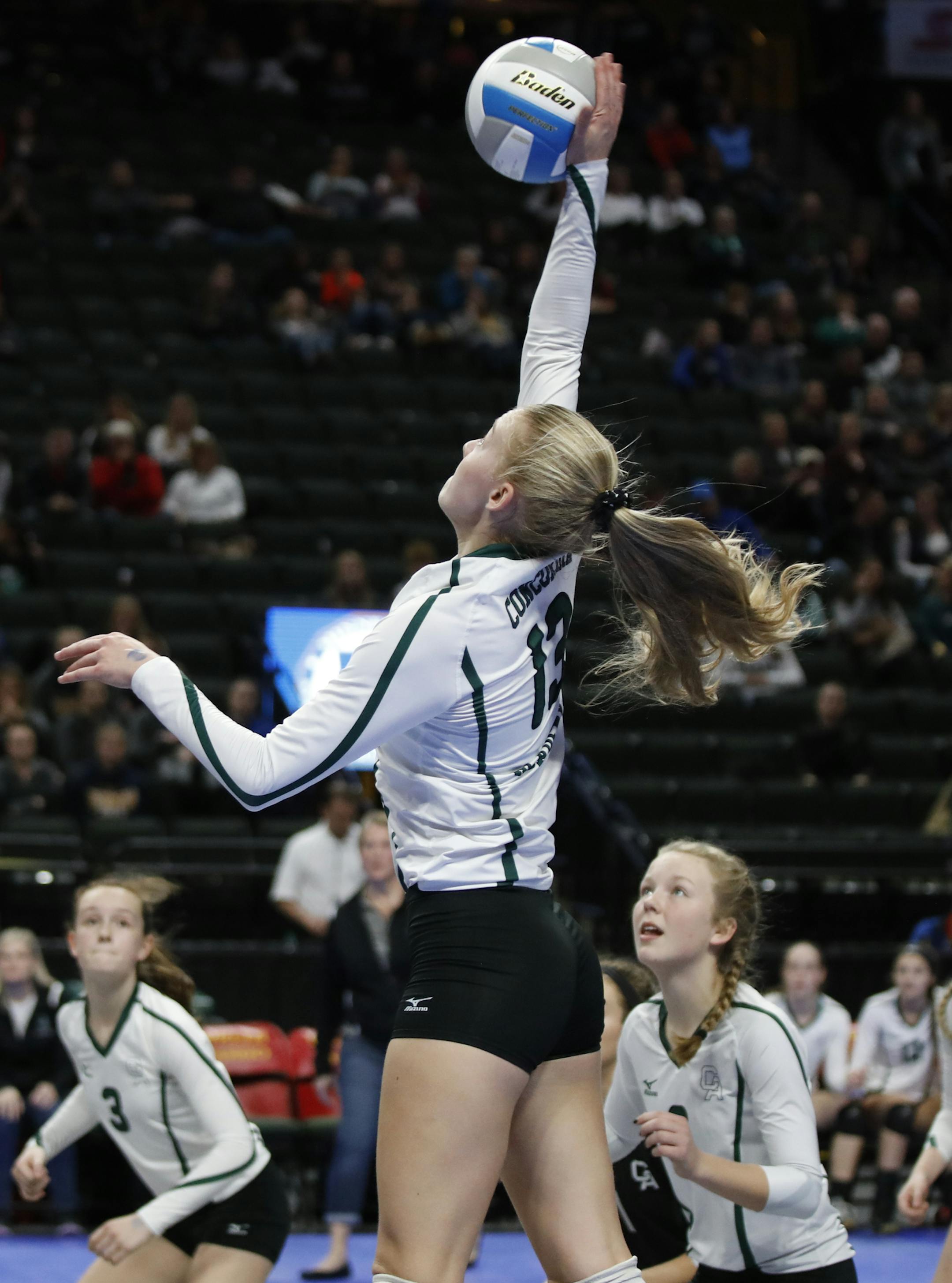 Erin Fallert, Concordia Academy senior, in the Class 2a semifinal match against Kenyon-Wanamingo Friday at Xcel Energy Center. Photog thinks she was serving, not 100 percent sure. -- Paul K.