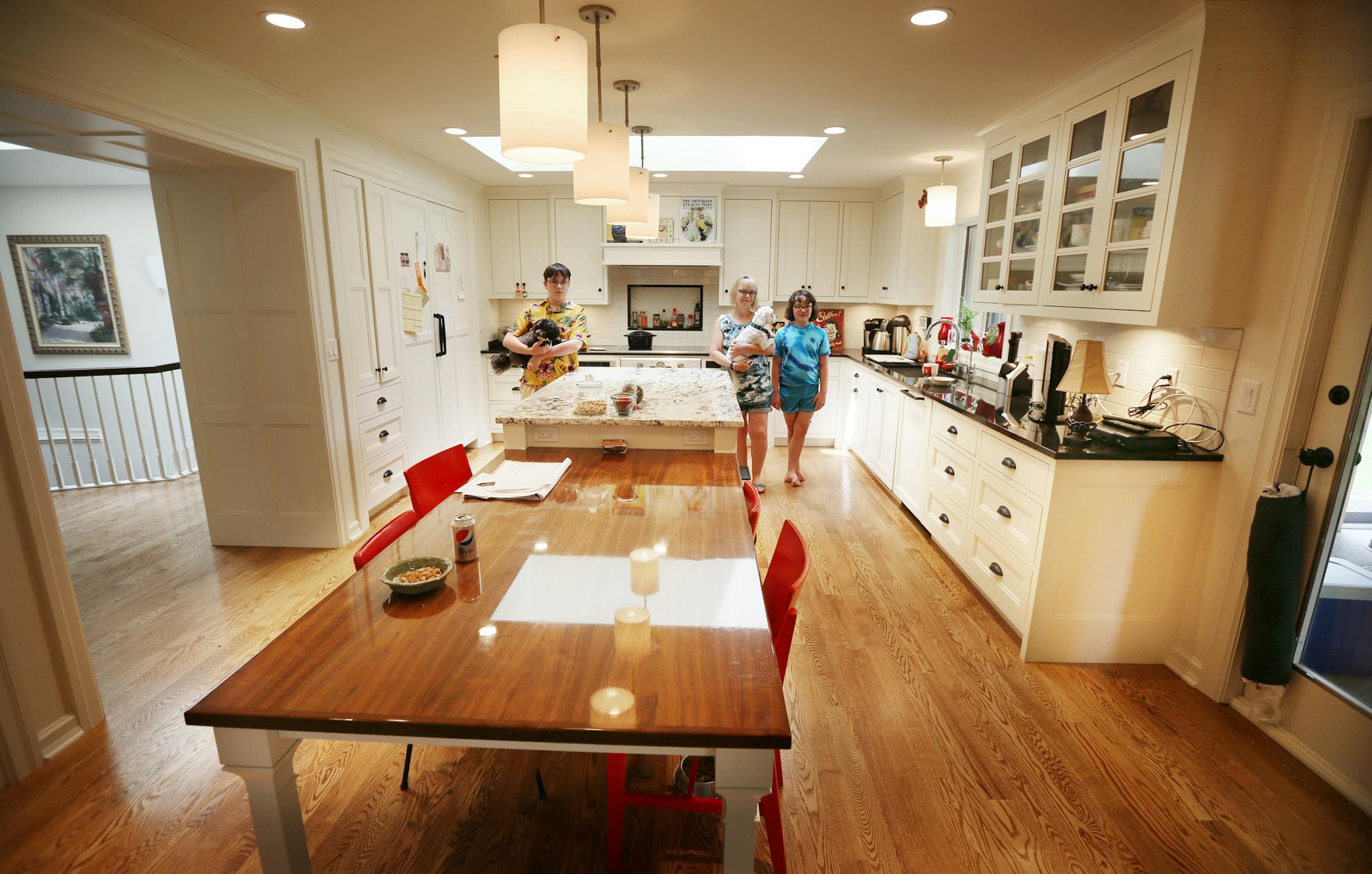 Luke and Emma posed with mom Mary Johnston in their newly remolded kitchen Tuesday June 16, 2015 in Edina, MN.] Jerry Holt/ Jerry.Holt@Startribune.com
