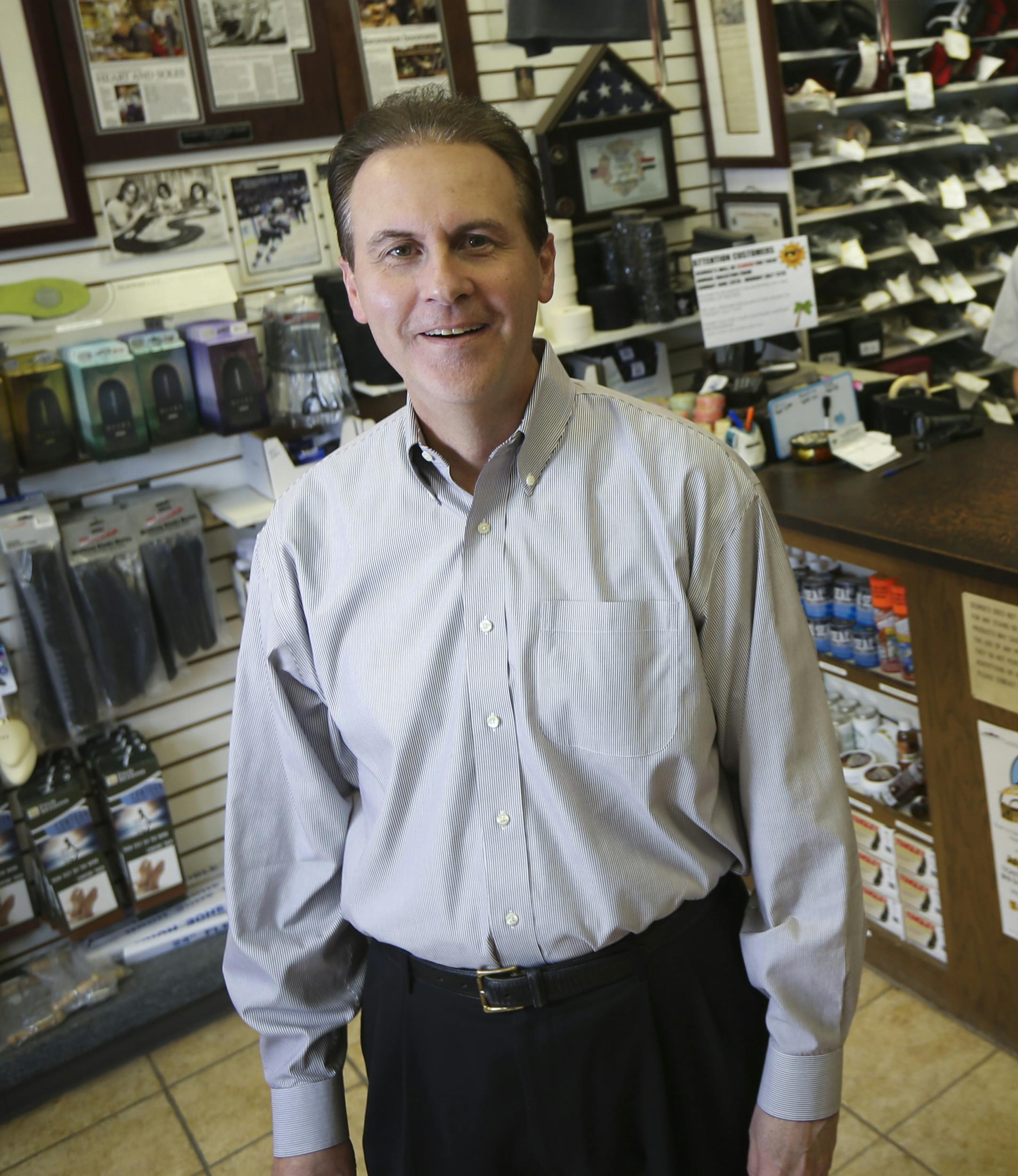 CEO Lee Schram of Deluxe Corp chatted about ice skating with George's Shoe Repair owners Chris George and Brian George at their Grand Avenue shop near Schram's St. Paul home on Tuesday, June 16, 2015. George's is a Deluxe small-business services client and also where the Schram family gets its shoes and skates serviced. RENEE JONES SCHNEIDER&#x2022; reneejones@startribune.com