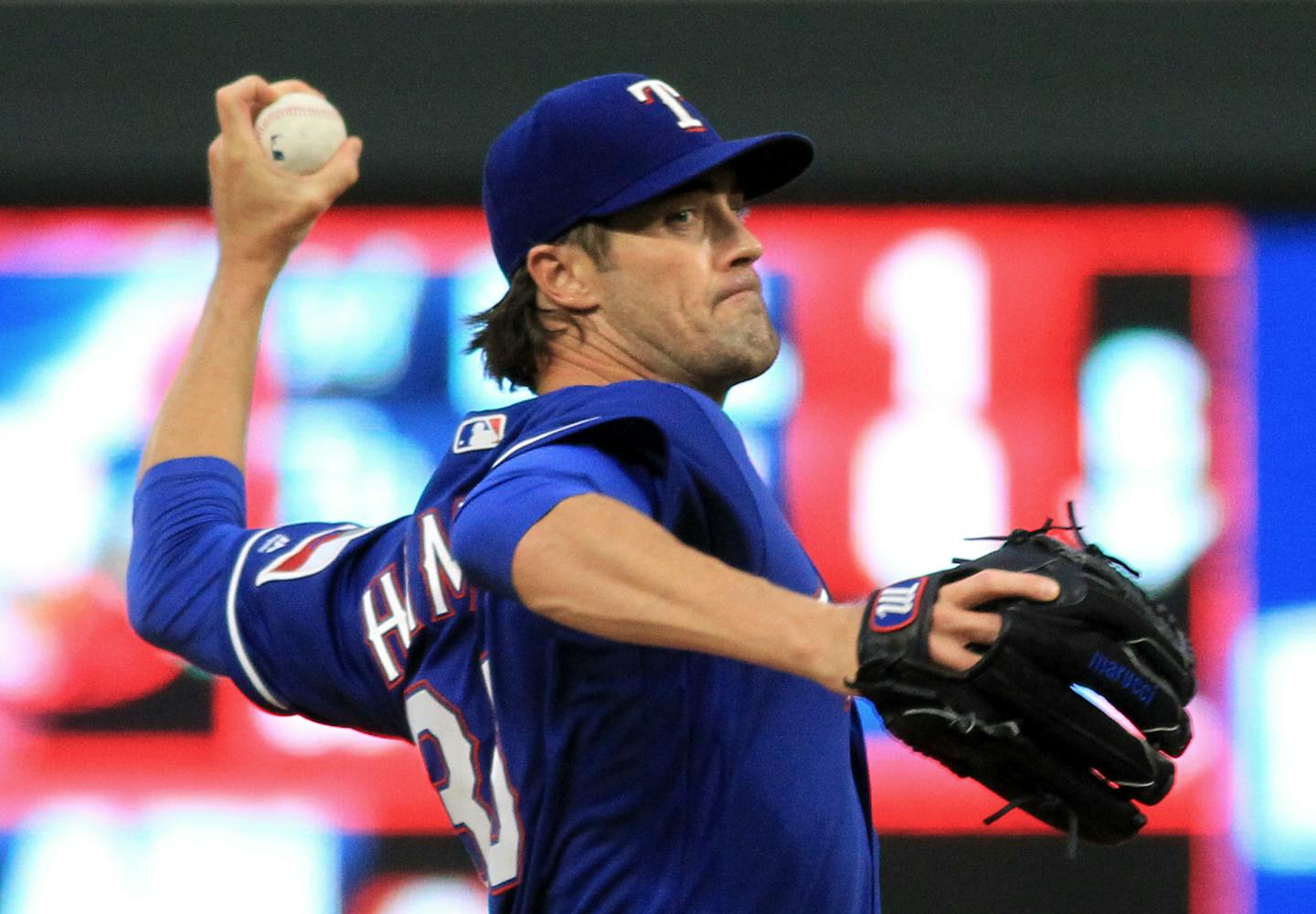 Texas Rangers pitcher Cole Hamels throws to the Minnesota Twins during the first inning of a baseball game Saturday, Aug. 5, 2017, in Minneapolis. (AP Photo/Andy Clayton-King)