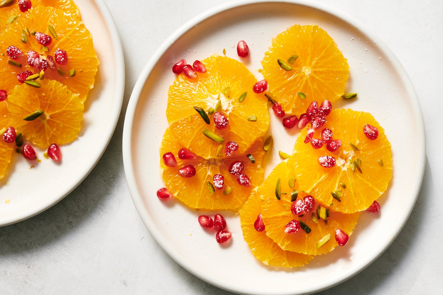 Orange salad with pomegranate. This extremely simple vegan dessert puts oranges on display. Food styled by Simon Andrews. (David Malosh/The New York Times)