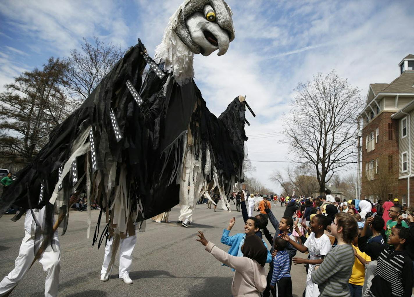 A giant bird puppet at the 2013 May Day Parade in Minneapolis, The annual event is sponsored by Heart of the Beast Puppet and Mask Theatre, which faces a financial shortfall as its fiscal year ends.