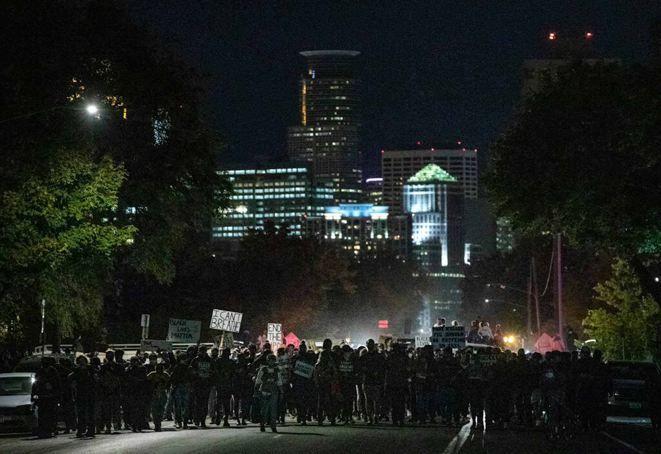About 300 people marched south on Portland Avenue in Minneapolis on Wednesday night, hours after fired police officer Derek Chauvin posted bond and was released.