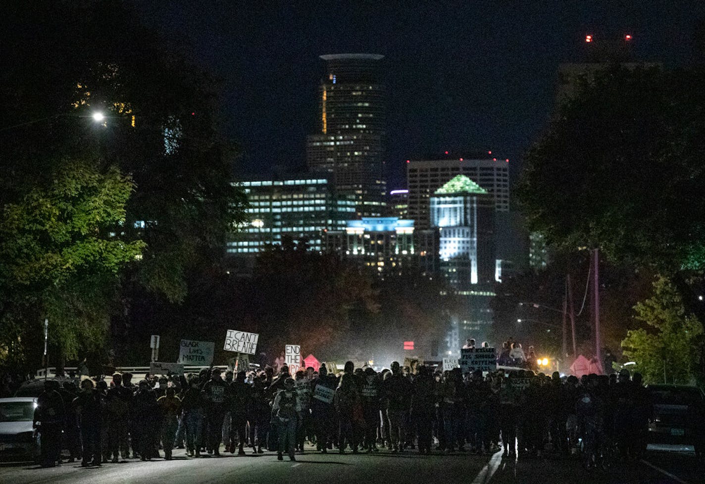 About 300 people marched south on Portland Avenue in Minneapolis on Wednesday night, hours after fired police officer Derek Chauvin posted bond and was released.