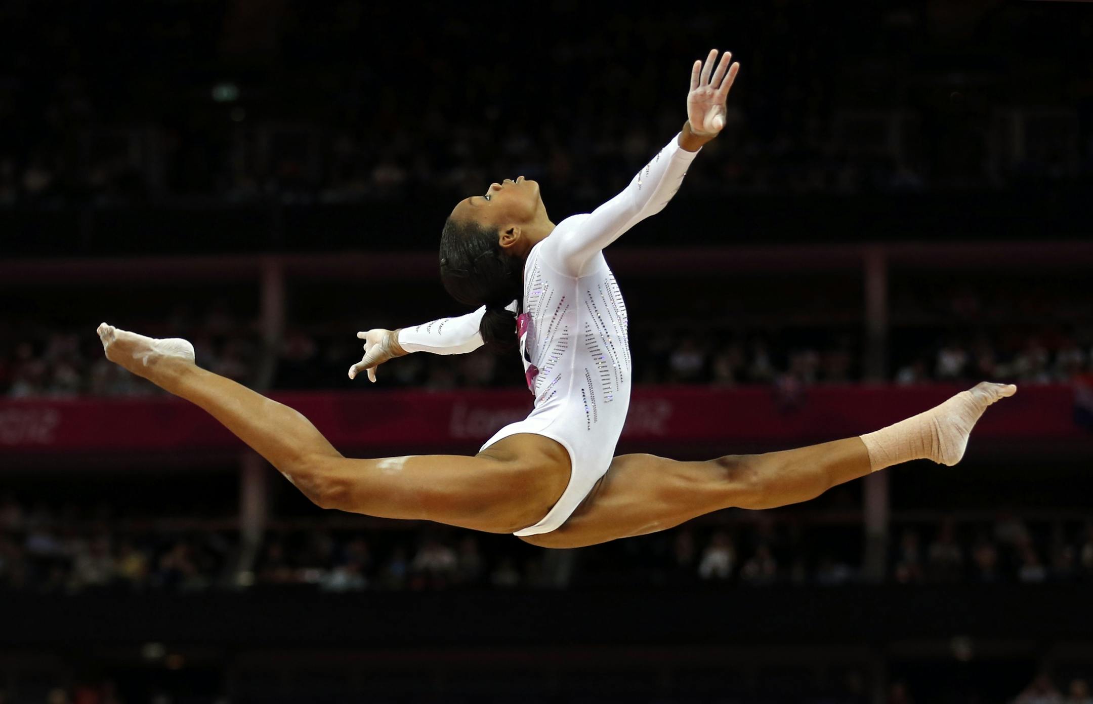 Gabby Douglas made history by becoming the first African-American to win the women's gymnastics all-around title.