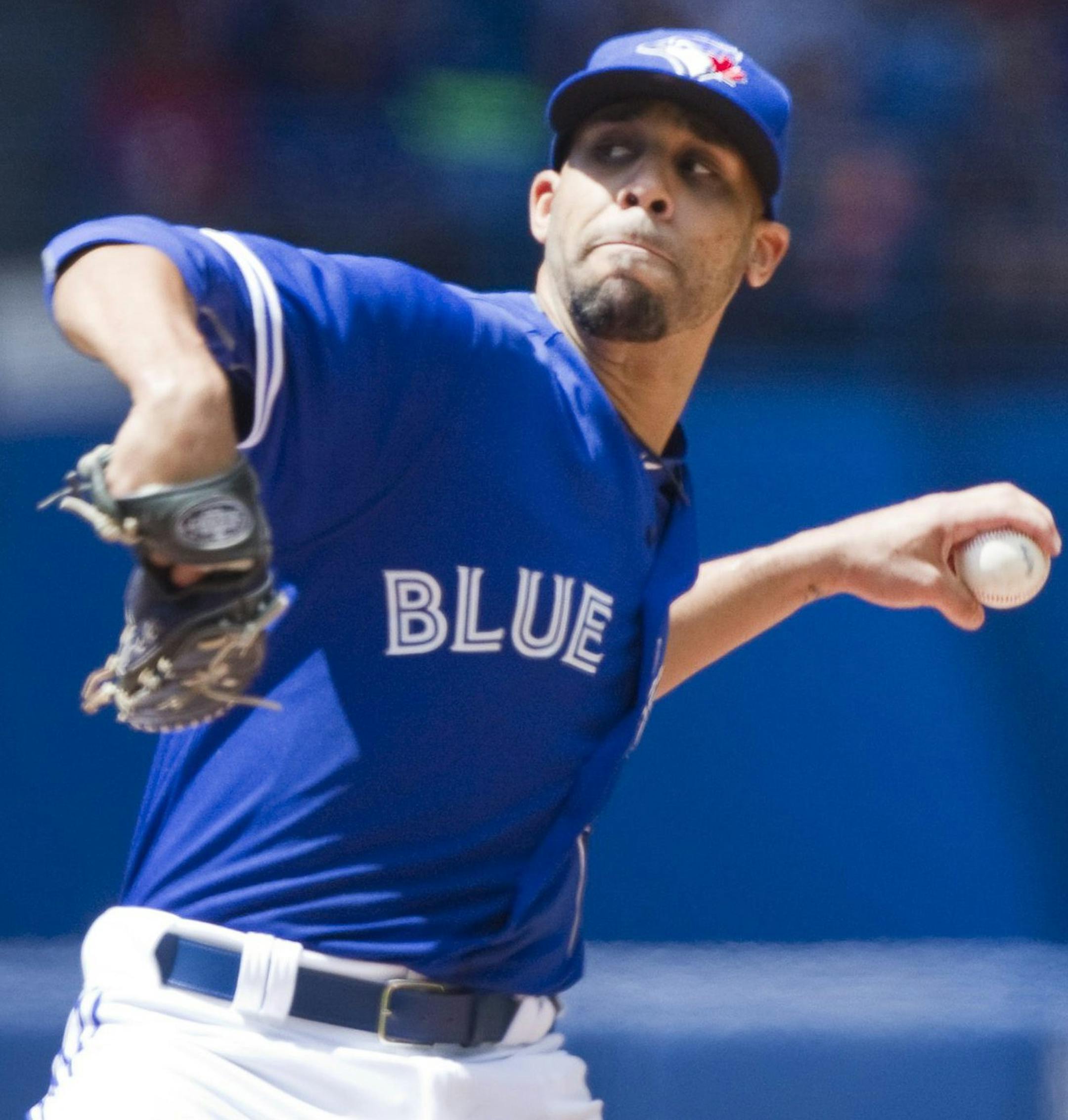 Toronto Blue Jays starting pitcher David Price throws against the Minnesota Twins during the second inning of a baseball game in Toronto on Monday, Aug. 3, 2015. (Fred Thornhill/The Canadian Press via AP)