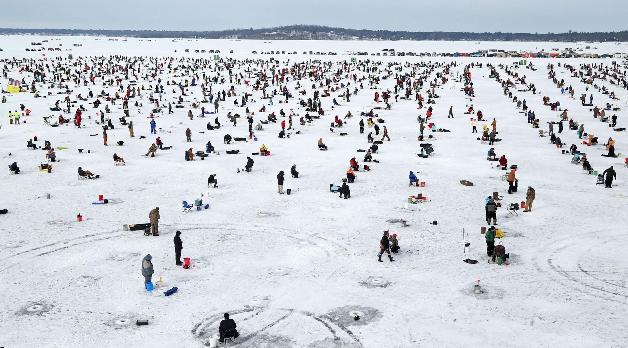 Some of the 10,000 ice fishing contestants on Hole in the Day Bay of Gull Lake during the Ice Fishing Extravaganza Saturday, Feb. 6, 2016, in Brainerd, MN.