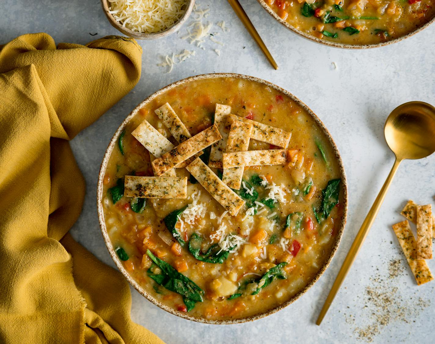 slow cooker Lentil Soup with crispy tortillas from Nicky Corbishley's "It's All About Dinner: Easy, Everyday, Family-Friendly Meals" (Kyle Books, 2022).