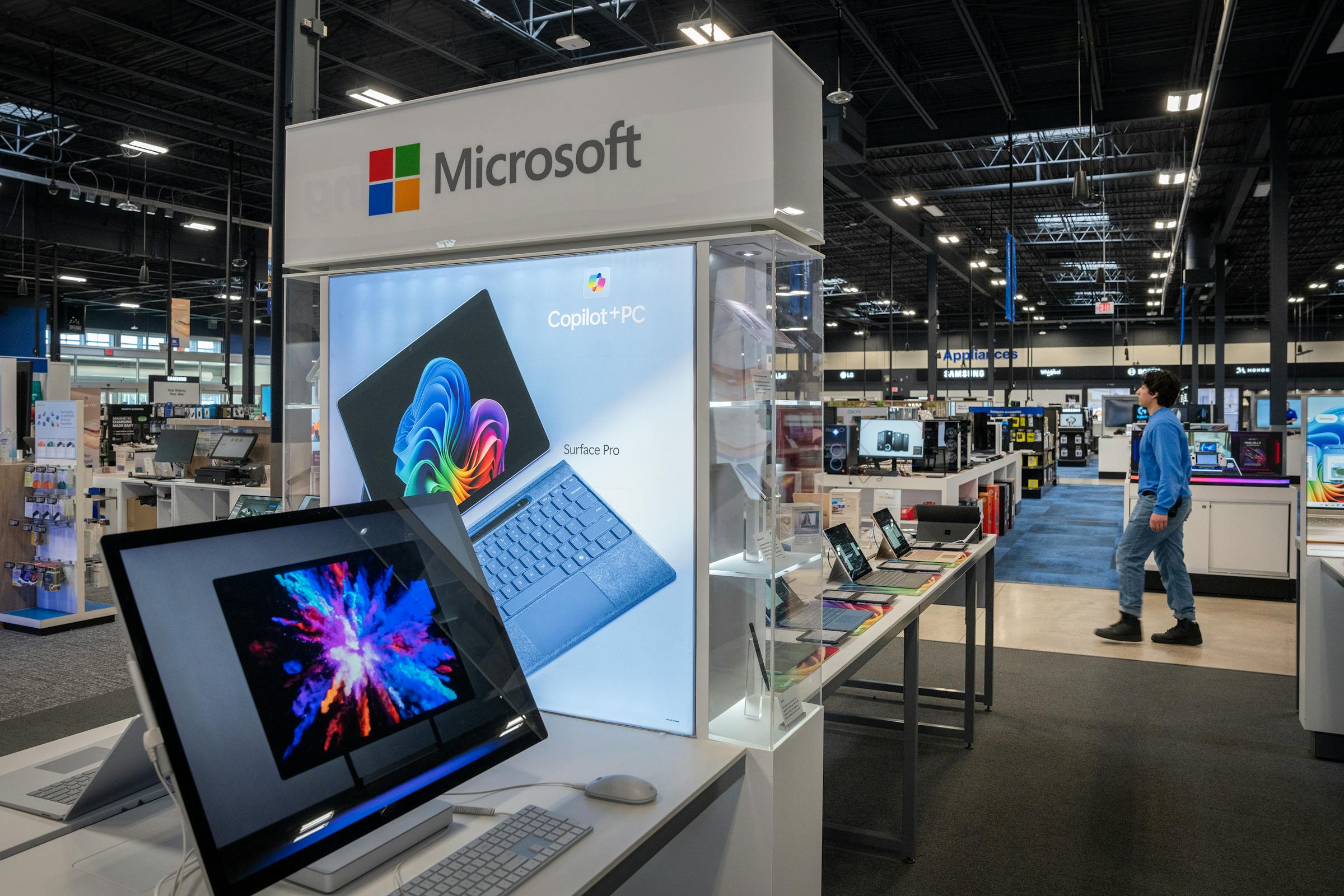 Best Buy announces layoffs, better-than-expected sales bump