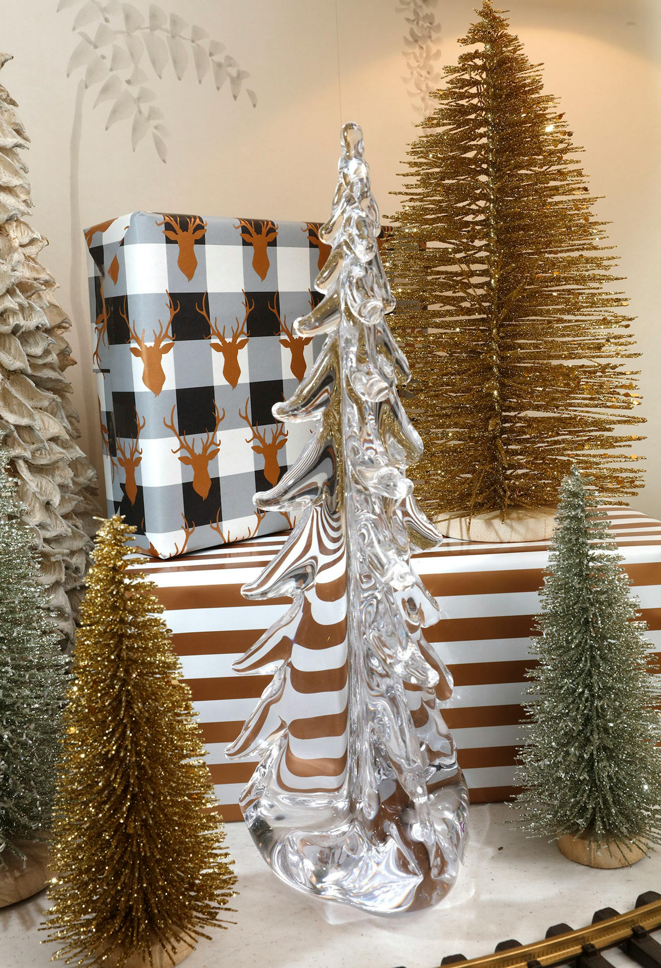 The palette of silver, gold, white and glass adds a touch of elegance.