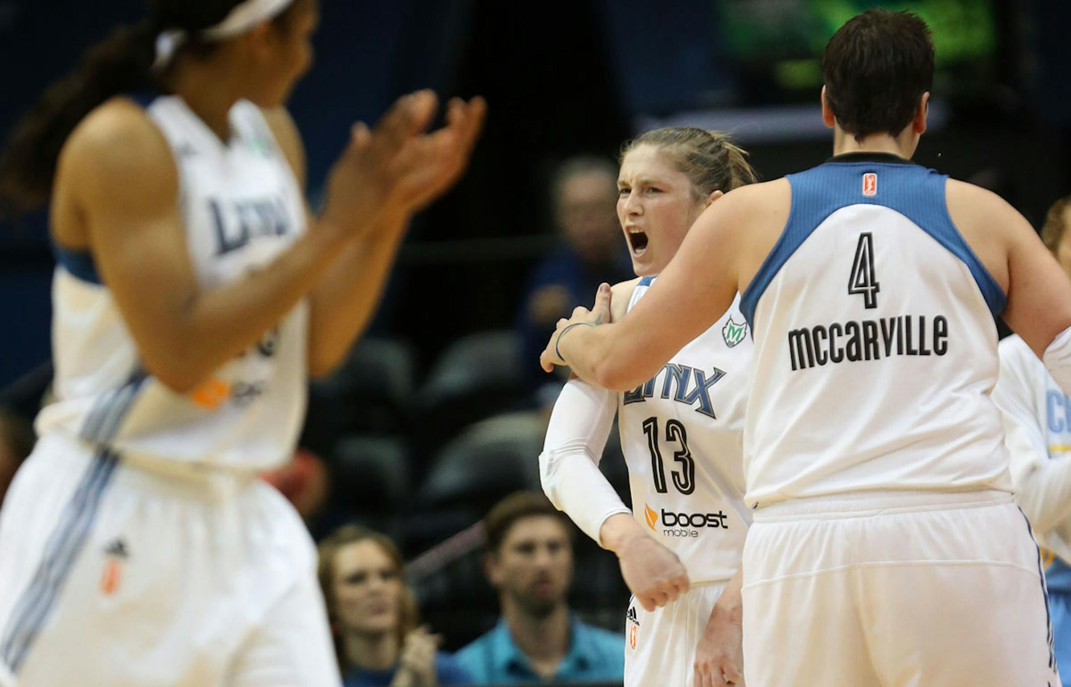 Lynx Lindsay Whalen celebrated with teammate Janel McCarville after the Sky called a timeout during the first half in Target Center in Minneapolis, Saturday September 14, 2013.