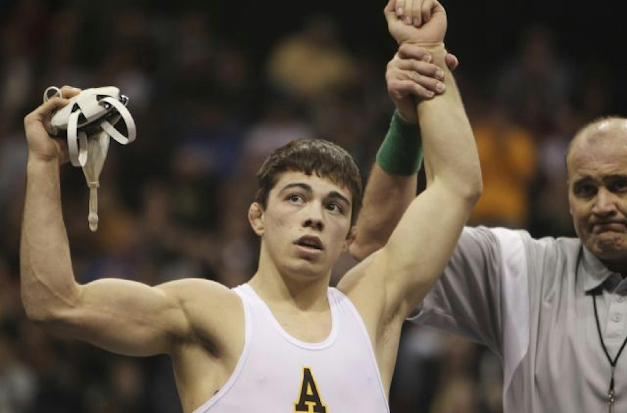 Apple Valley's Destin McCauley won his fifth title with a pin in the first round of AAA at 152 pounds against Adam Jacskon of Rosemount.