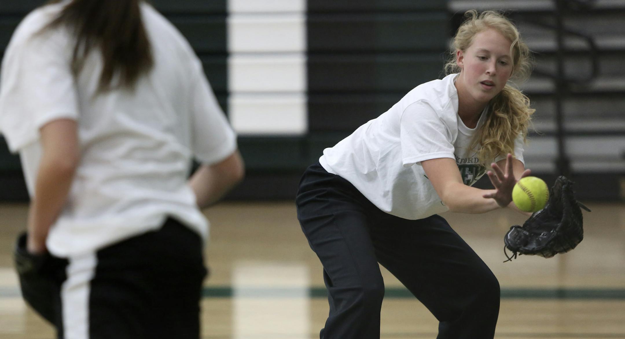 Payton Palmeri ran through drills as the Rockford softball team practiced in the high school's gym in Rockford, Min., Thursday, April 11, 2013. ] (KYNDELL HARKNESS/STAR TRIBUNE) kyndell.harkness@startribune.com