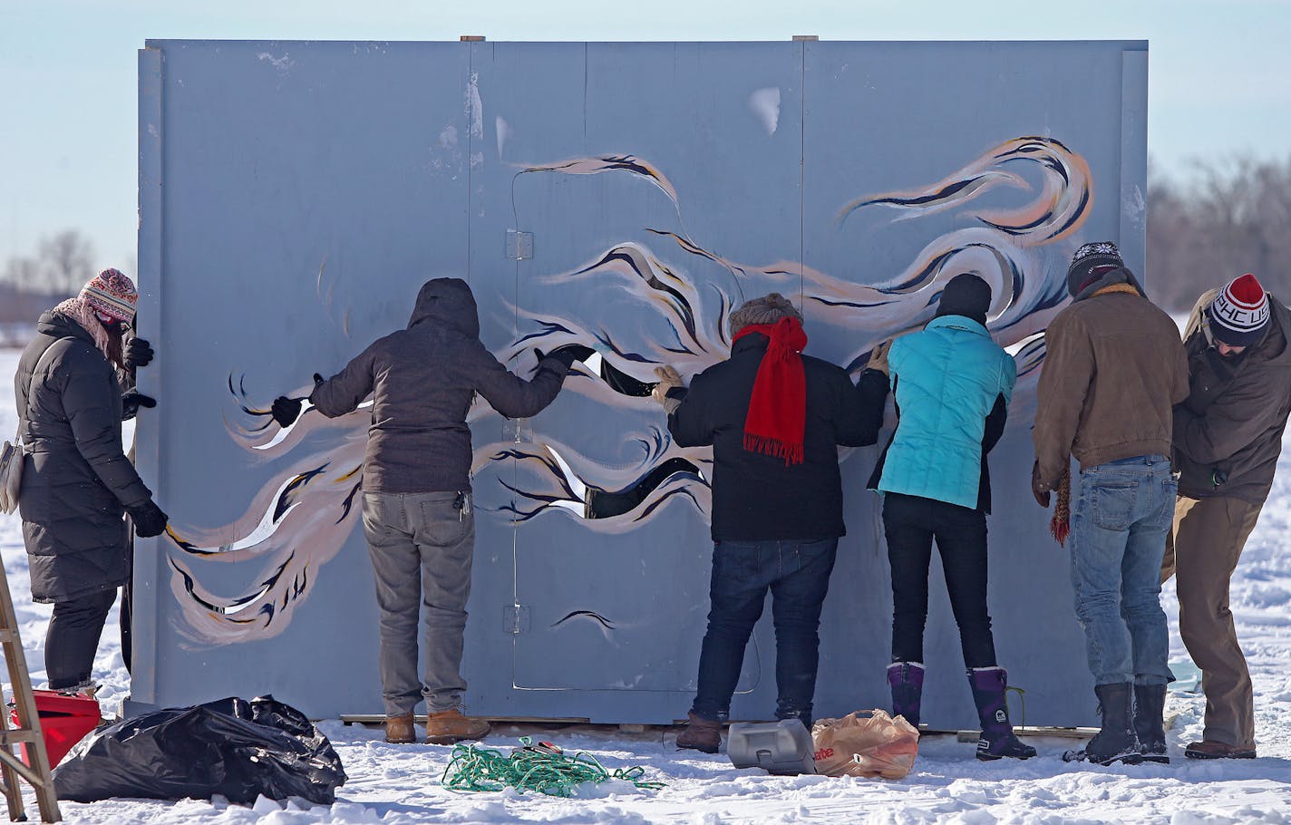 Artists worked on putting together an ice house known as "The Wind Shanty," on White Bear Lake, Wednesday, January 29, 2014. (ELIZABETH FLORES/STAR TRIBUNE) ELIZABETH FLORES &#x2022; eflores@startribune.com