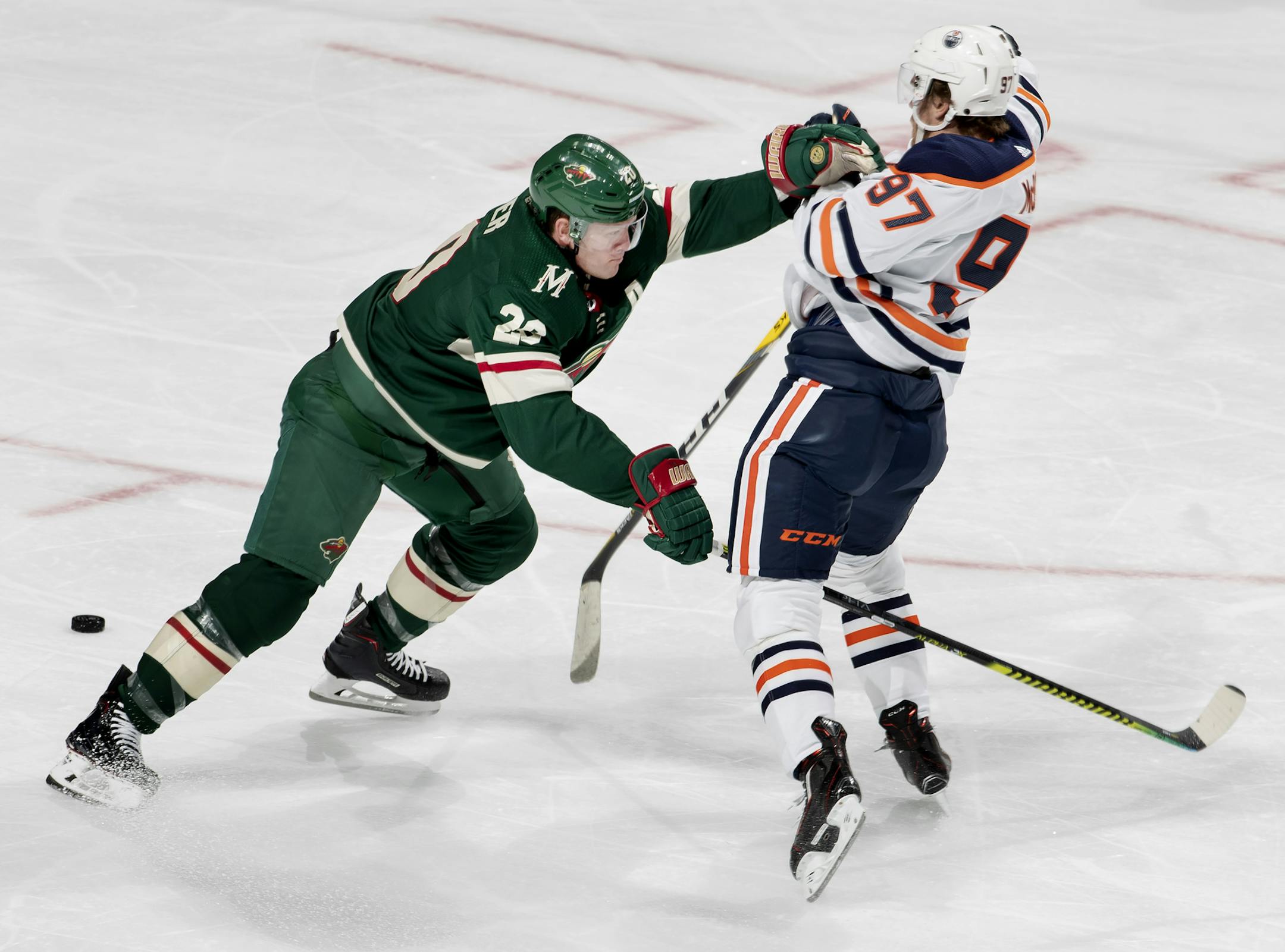 Ryan Suter (20) of the Minnesota Wild collided with Connor McDavid (97) of the Edmonton Oilers in the second period. ] CARLOS GONZALEZ • cgonzalez@startribune.com – St. Paul, MN – October 22, 2019, Xcel Energy Center, NHL, Hockey, Minnesota Wild vs. Edmonton Oilers