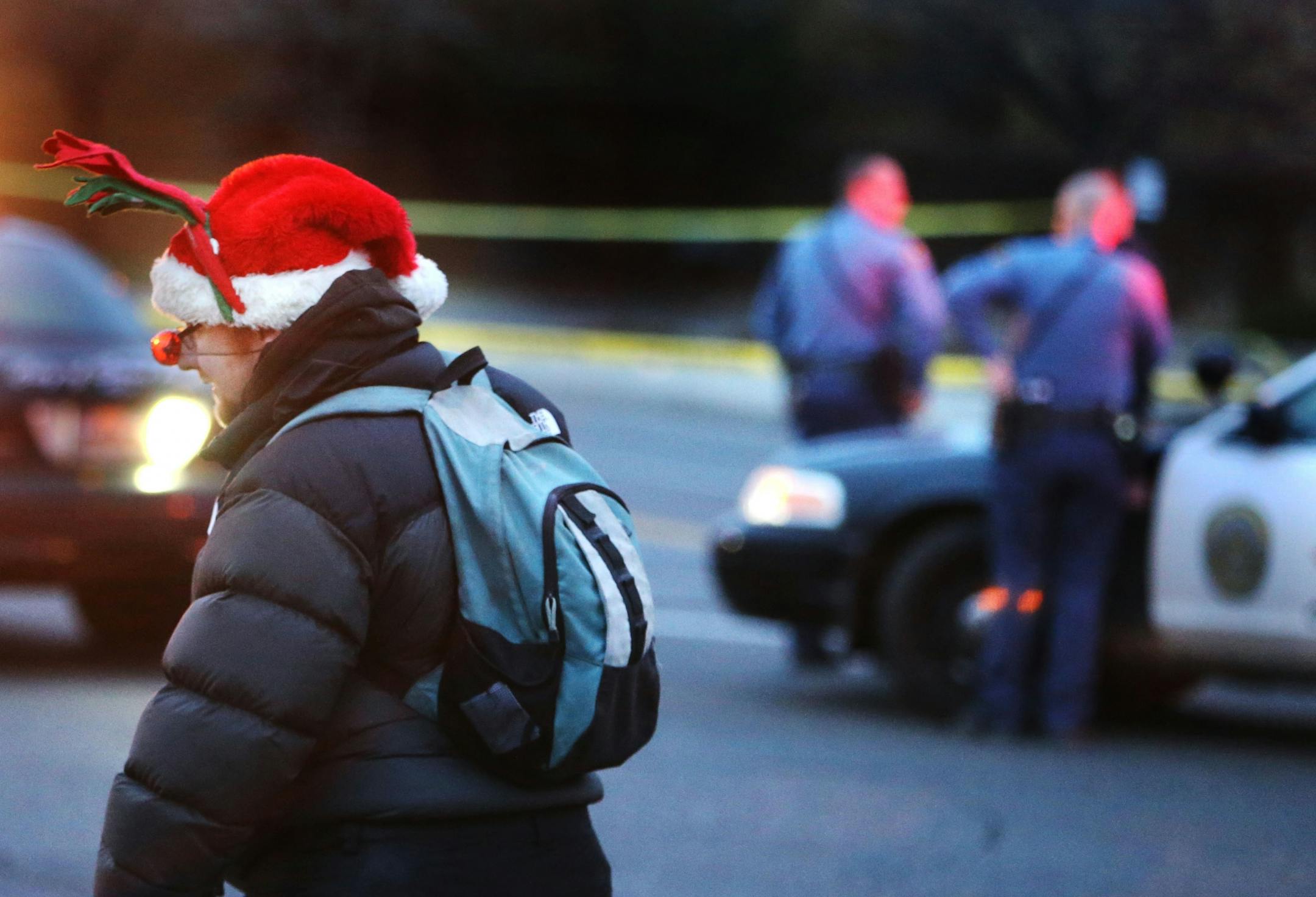 Scene of an early morning homicide where two persons are dead and a third critically wounded near the Salvation Army at 7th St and Smith Ave. Thursday, Dec. 10, 2015, in St. Paul, MN. Here, Jimmy Gerding, in the spirit of the holidays, observes the scene.