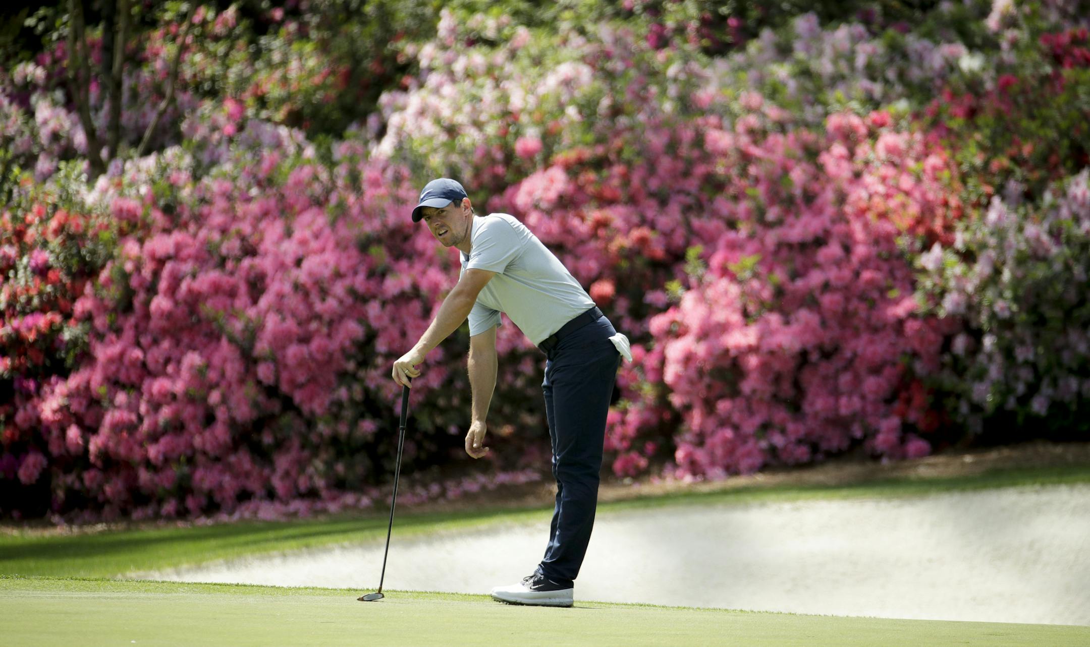 Rory McIlroy, of Northern Ireland, watches his putt on the 13th hole during a practice round for the Masters golf tournament Monday, April 8, 2019, in Augusta, Ga. (AP Photo/Charlie Riedel)
