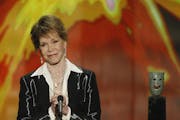 Mary Tyler Moore accepts her Lifetime Achievement Screen Actors Guild award during the 18th Annual Screen Actors Guild Awards show on Jan. 29, 2012 at