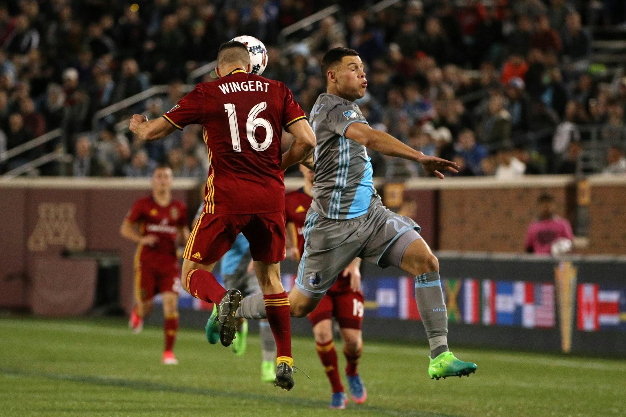 Minnesota United forward Christian Ramirez (21) went up against Real Salt Lake defender Chris Wingert (16) for the ball in the first half.