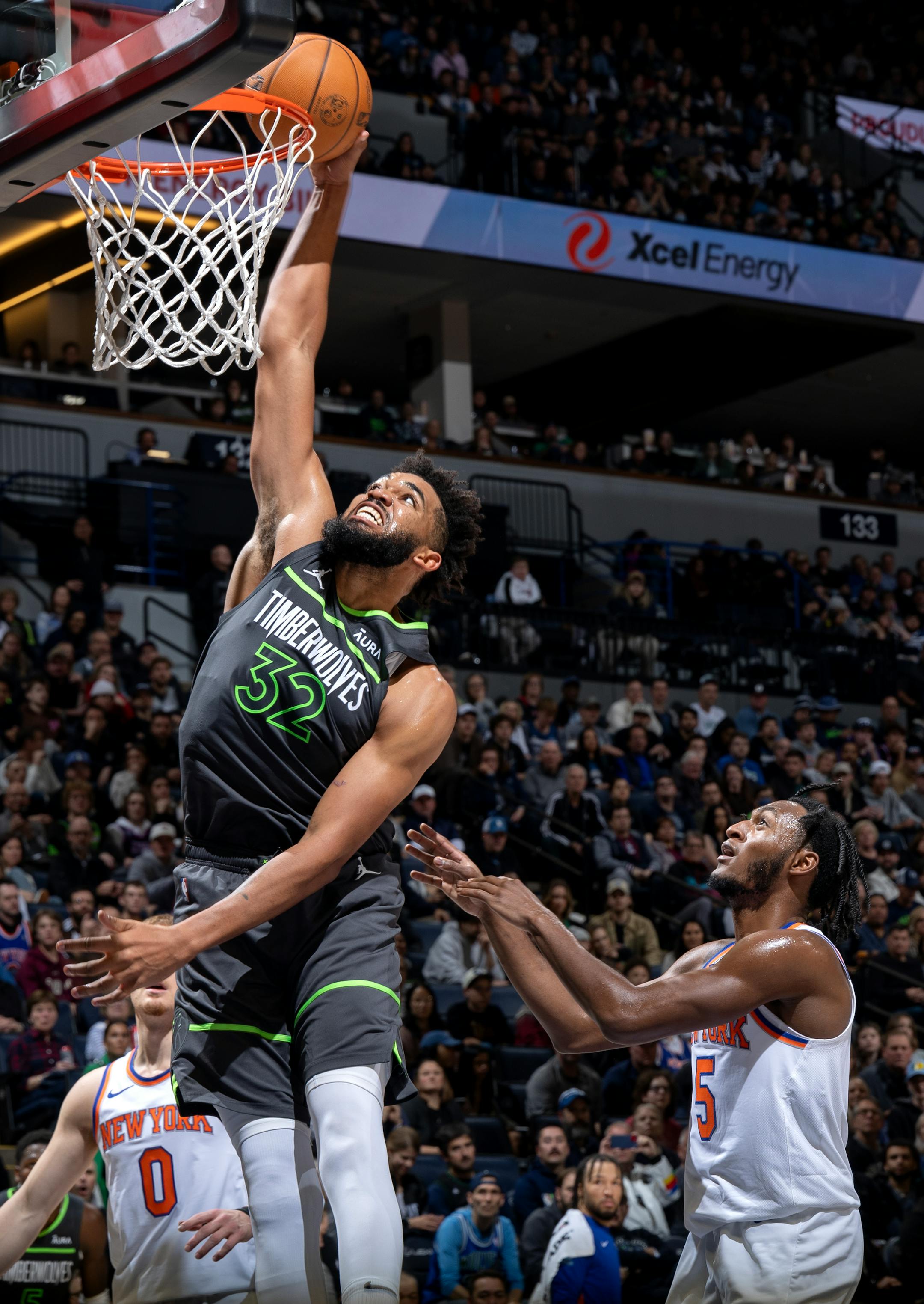 Karl Anthony Towns (32) of the Minnesota Timberwolves attempts a dunk in the fourth quarter Monday, November 20, 2023, at Target Center in Minneapolis, Minn. The play was called off because of a foul. ] CARLOS GONZALEZ • carlos.gonzalez@startribune.com