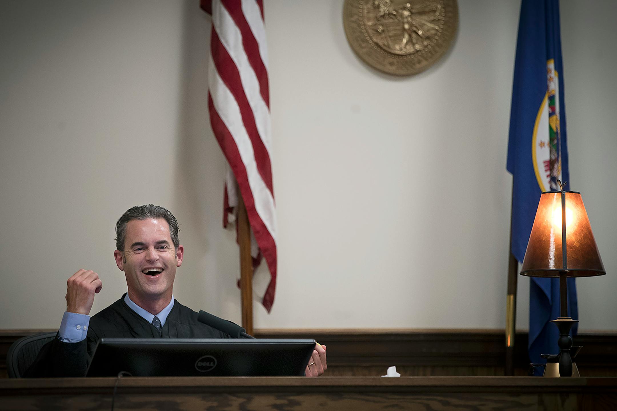Duluth Judge Shaun Floerke chatted with defendants as they checked in during DWI court, Friday, August 11, 2017 in Duluth, MN.