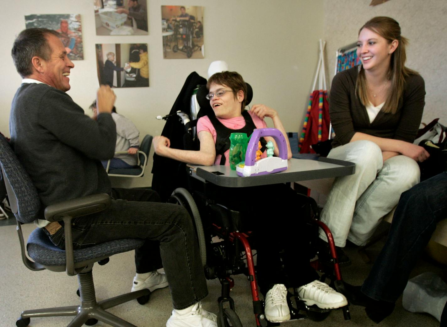 Steve Helle worked split shifts with his wife to take care of Stephanie during her childhood; she turns 30 on March 31. Sister Jenna, 21, a college senior, now looks after a woman with Down syndrome. She says taking care of her older sister gave her "a lot of compassion and patience and understanding."