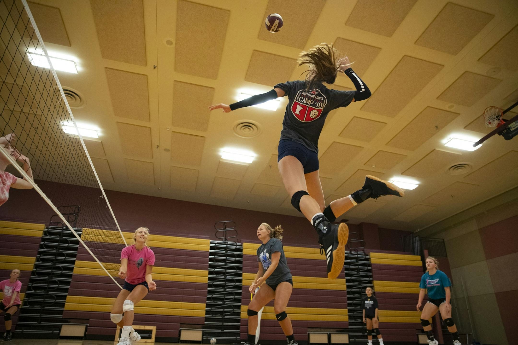 Jordan Mitchell jumped up for a spike during Denfeld High School girl's volleyball practice on Tuesday. Girl's volleyball has been moved to the spring for the 2020-21 school year.