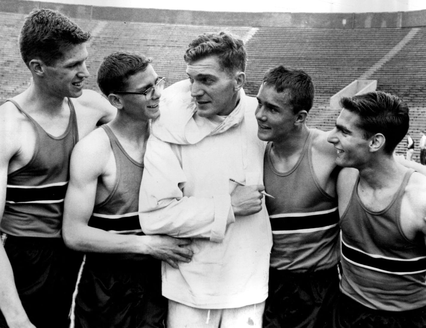 June 4, 1958 St. Louis park won the state high school track championship for the first time and here is the record setting mile relay team that helped Park Clinch the title. Let to right are Ed. Gale, Lynn Mattis, Coach Roy Griak, Art Patterson and Bill Kauffmann. June 5, 1958 Paul Siegel, Minneapolis Star Tribune