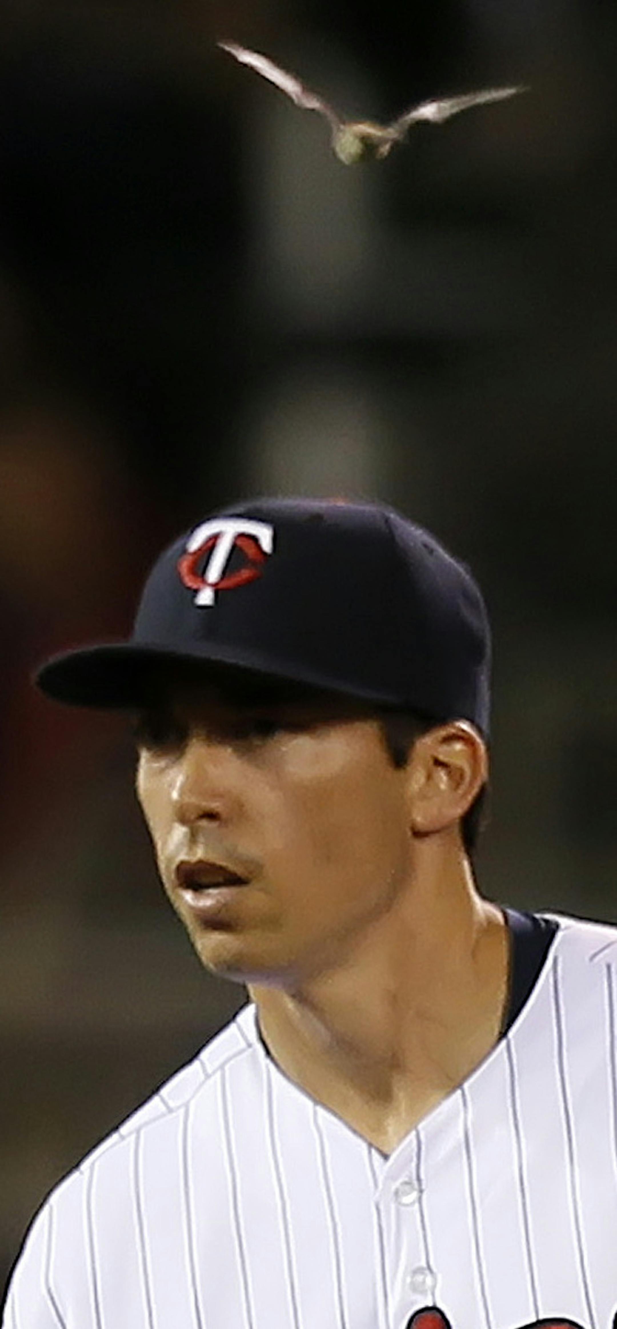 The Twins couldn't find their bats Friday night agains't the Wite Sox, but this bat found the twins Short Stop Doug Bernier. The bat flew around the infield for a few minutes before being aprehended by security. ] Twins vs. White Sox BRIAN PETERSON ‚Ä¢ brianp@startribune.com Minneapolis, MN - 08/16//2013