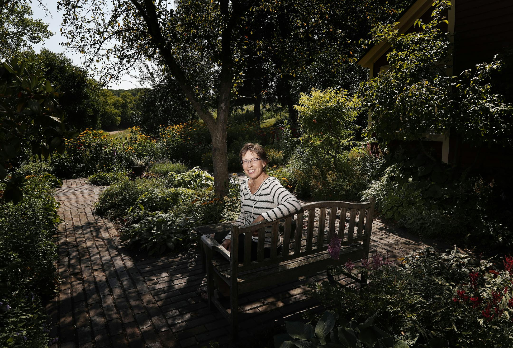 Garden writer and horticulturist Lynn Steiner, author of "Grow Native," in the cottage-style garden that surrounds her restored 1898 farmhouse in Washington County