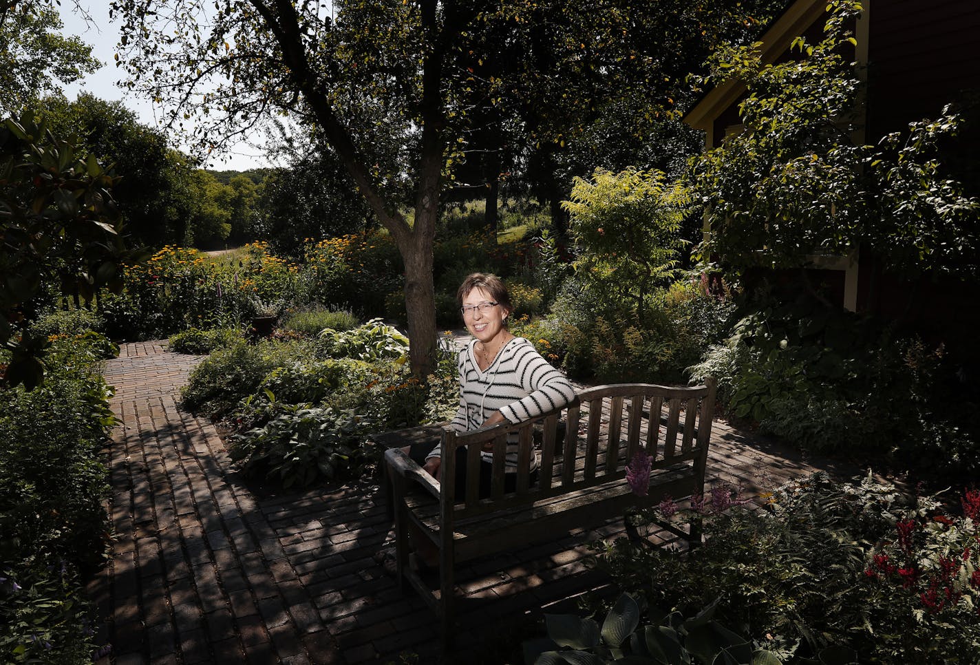 Garden writer and horticulturist Lynn Steiner, author of "Grow Native," in the cottage-style garden that surrounds her restored 1898 farmhouse in Washington County