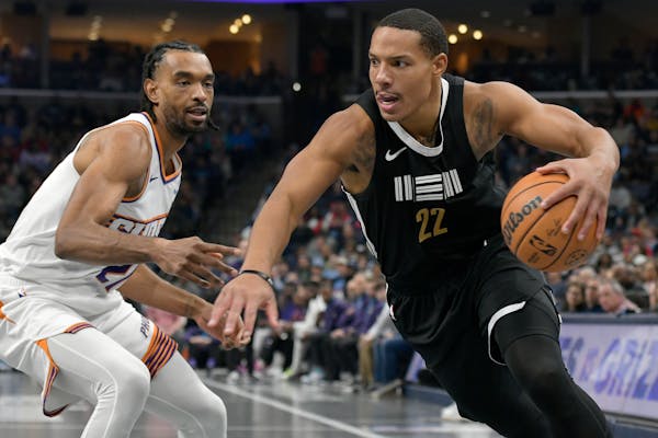 Grizzlies guard Desmond Bane (22), seen Friday in Memphis, Tenn., is averaging 24.3 points as his team faces injuries and Ja Morant’s suspension. 
