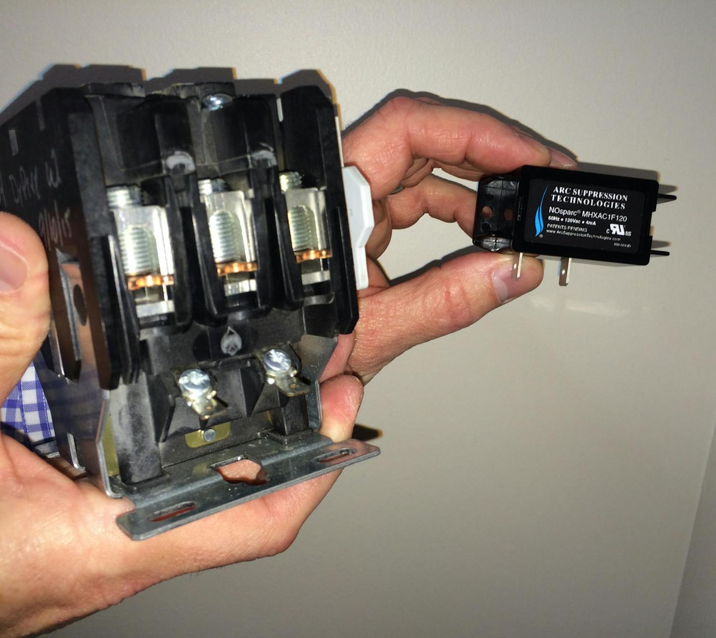 A "NOsparc" arc-suppression device (right) dramatically extends the life of electromechanical relays (left) and protects them electrical arcing that can cause relay failure and equipment stoppage.