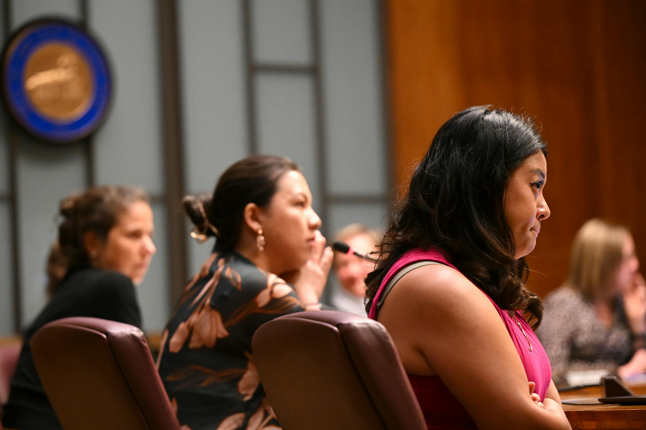From right, council members Mitra Jalali and Nelsie Yang listen to public comment during a city council meeting.