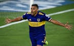 Ramon Abila of Boca Juniors celebrates after scoring the opening goal against River Plate during a Copa Diego Maradona soccer match hat the Bombonera 