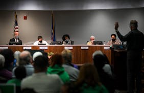 The St. Paul district is one of several holding school board elections this year. Zuki Ellis, center, and Chauntyll Allen, far right, are the only two