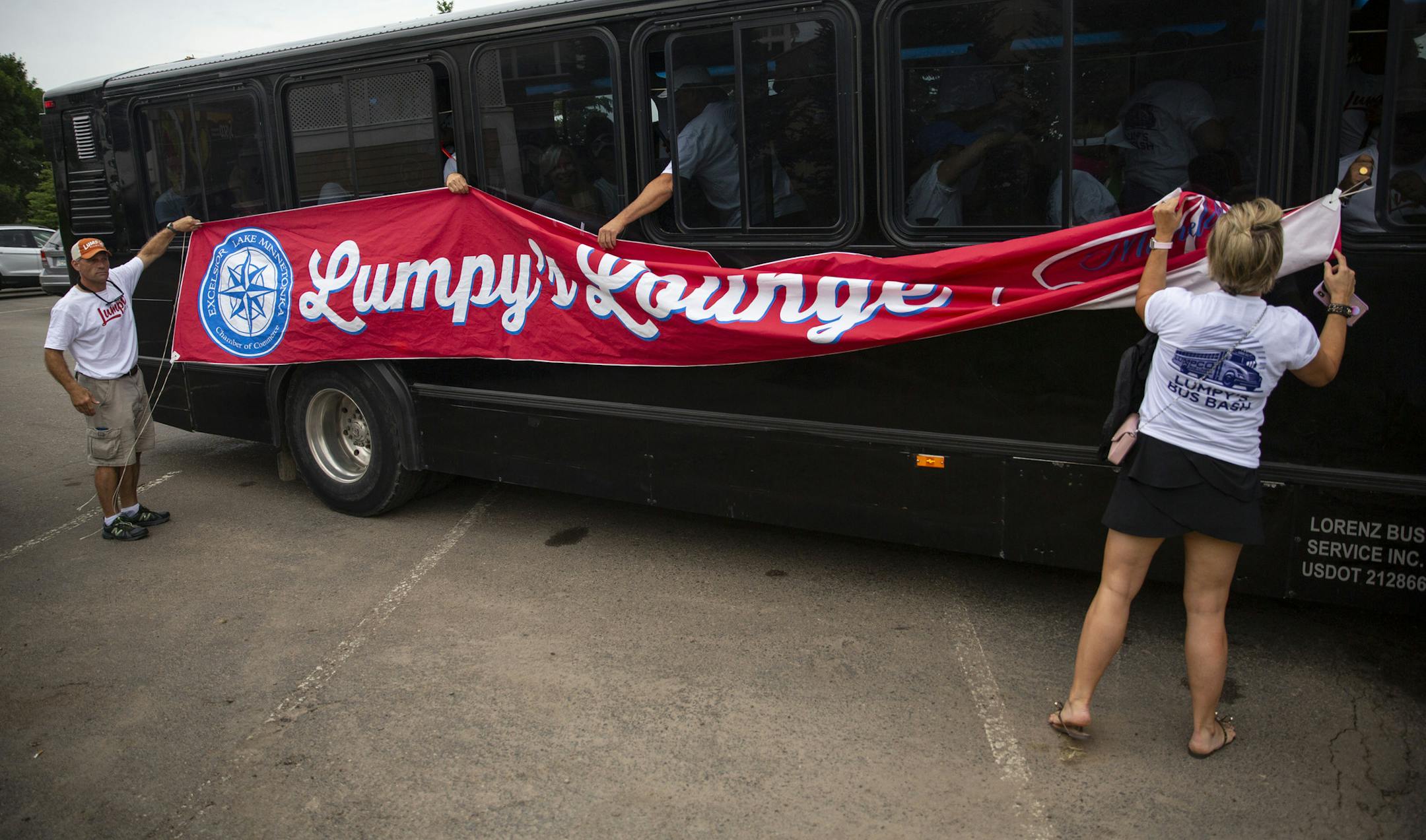 A group of Tim Herron fans raise a "Lumpy's lounge" sign on their bus that comes out to PGA tour events occasionally to support Herron. ALEX KORMANN &#xa5; alex.kormann@startribune.com Competitors for the 3M Open took to the course on Friday for the second day of the PGA tour event. Notable players include Phil Mickelson, Brooks Koepka, Patrick Reed and Bryson DeChambeau.