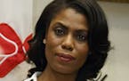 FILE - In this Feb. 14, 2017, file photo, Omarosa Manigault-Newman, then an aide to President Donald Trump, watches during a meeting with parents and 